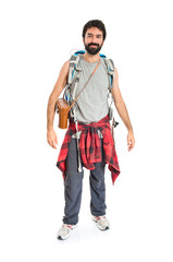 Young backpacker over white background