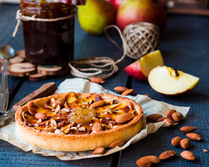 tart with pear jam, apples and caramel, horizontally