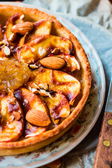 tart with pear jam, apples and caramel