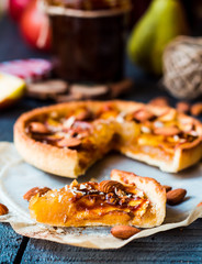 slice of tart with pear jam, apples and caramel