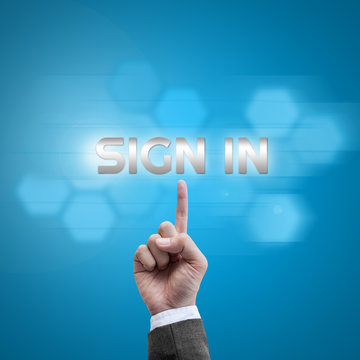 Businessman hand working with modern computer interface as Sign