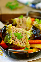 baked pudding from a Savoy cabbage with meat