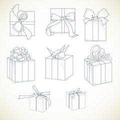 Set of hand drawn gift boxes with bows and ribbons.