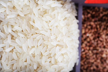 Groats in wooden box closeup