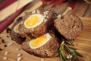 Baked meatloaf with boiled eggs for Easter