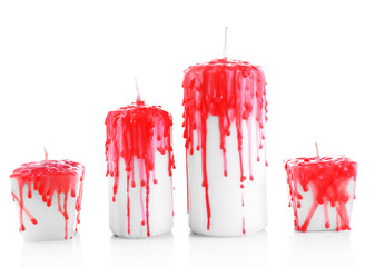 Bloody candles for Halloween holiday, isolated on white