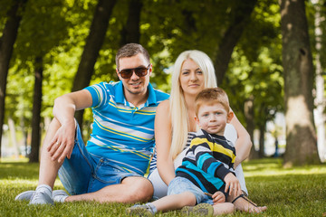 Fototapeta premium Happy family in the summer park
