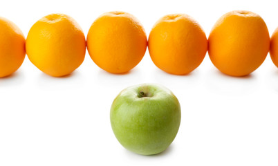 Juicy oranges and apple, isolated on white
