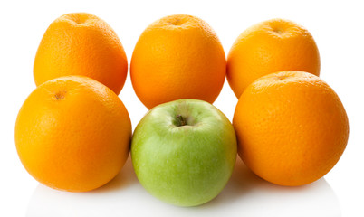 Juicy oranges and apple, close-up