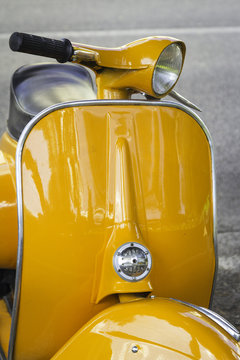 Yellow vintage motorcycle. Color image