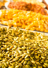 pumpkin seeds and fried broad beans in market stand