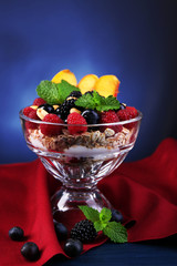Healthy breakfast - yogurt with  fresh fruit, berries and
