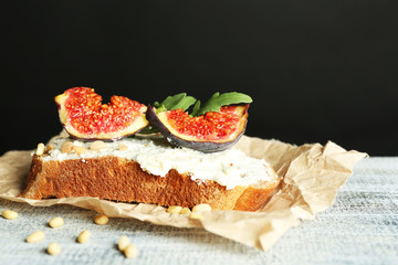 Tasty sandwich with sweet figs and cottage cheese