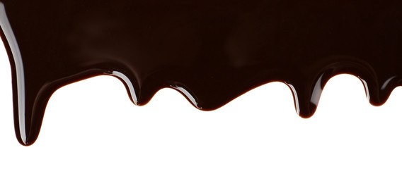 Melted chocolate dripping on white background
