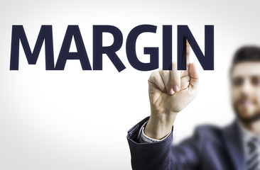 Business man pointing to transparent board with text: Margin