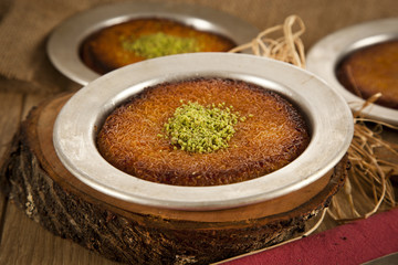 Turkish dessert kunefe with pistachio powder