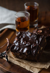 Homemade chocolate brownies with nuts and ganache