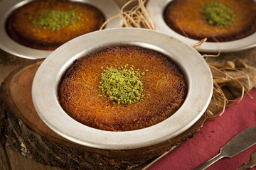 Turkish dessert kunefe with pistachio powder