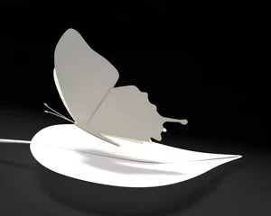 Fototapeten Vlinder van papier op blad © emieldelange