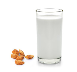 glass of milk and almond isolated on white background