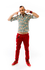 model isolated on plain background plugging ears with fingers