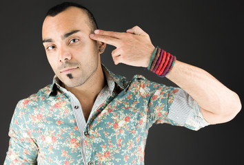 model isolated on plain background hand gesture gun