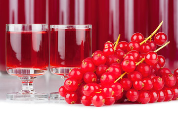 Red currants and liqueur in a glass