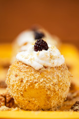 ppApple dessert with nuts, whipped cream and blackberry