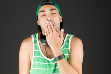 model isolated on plain background tired bored yawning