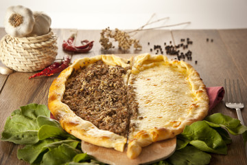 Delicious heart shaped meat and cheese Turkish pizza pide