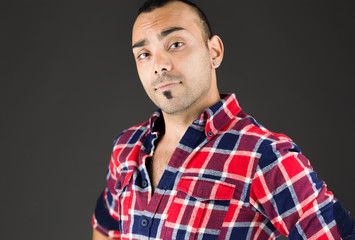 model isolated on plain background pround confident hands on hip