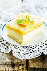 cake with orange, cream cheese and crumbs