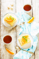 cake with orange, cream cheese and crumbs