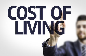 Business man pointing the text: Cost of Living