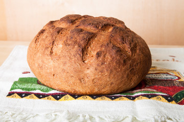 Homemade bread on a towel. Shallow depth of field