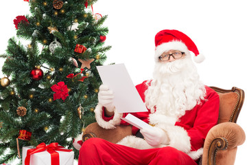 man in costume of santa claus with letter