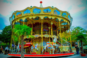 Vintage carousel at sunset in Paris