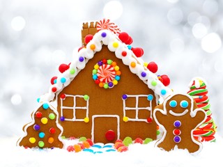 Christmas gingerbread house with silver light background