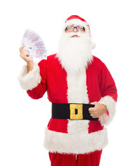 man in costume of santa claus with euro money