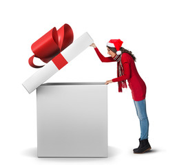 Woman opening a large present