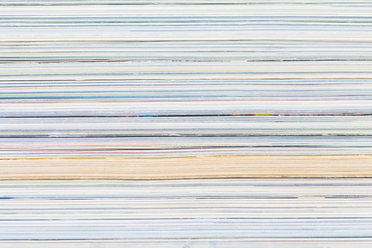 close-ups of stack of colorful magazines