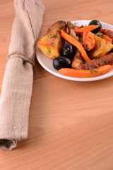 Fresh tasty Russian salad served with carrots