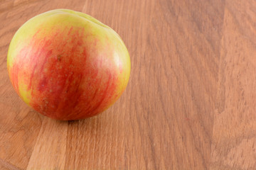 Apples on wooden background