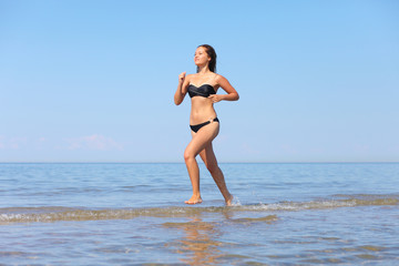woman running in the water
