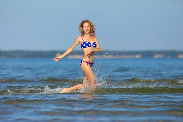 woman running in the water