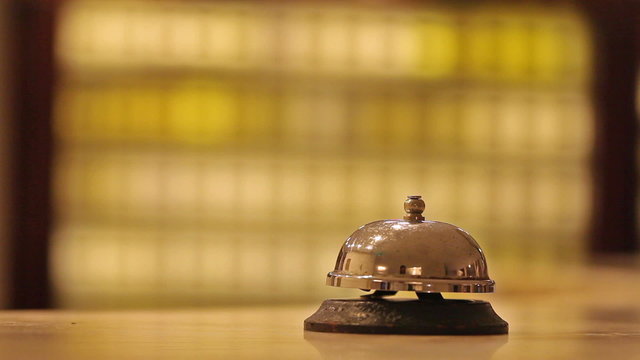 call at old hotel bell on a wood stand
