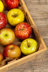 Wooden crate box full of fresh apples