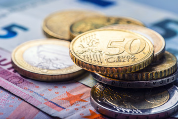 Euro money.Several euro coins and banknotes.Macro.