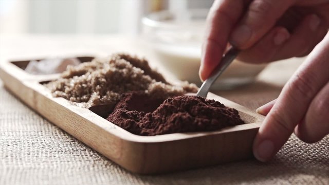 Raw Cacoa Powder on a Spoon, Slow Motion
