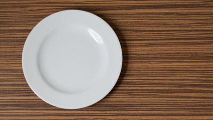Plate on Wood background